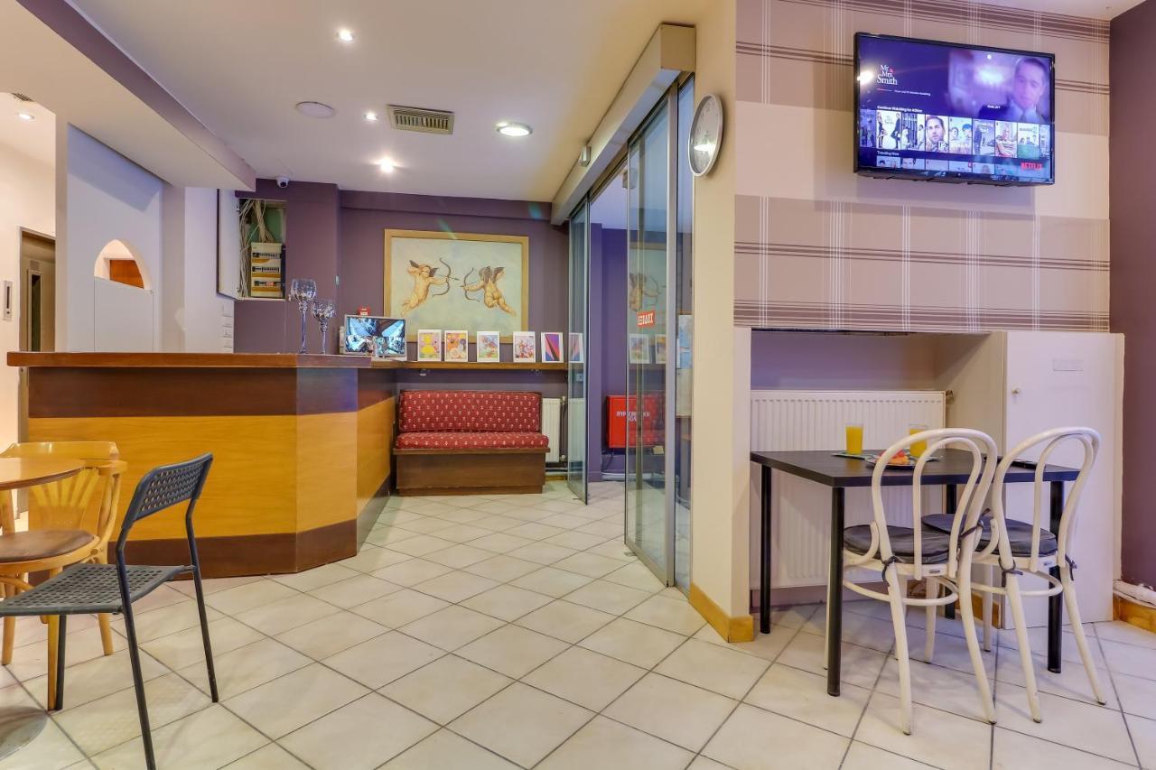 Hoteleros Dionysos Athens Atenas Exterior foto